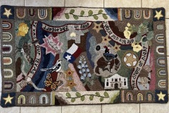 Hooked rug using a pattern by Susan Quicksall